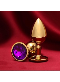 Золотистая анальная пробка с фиолетовым кристаллом - Сима-Ленд - купить с доставкой в Тюмени