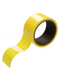 Желтый скотч для связывания Bondage Tape - 18 м. - California Exotic Novelties - купить с доставкой в Тюмени