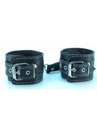 Чёрные кожаные наручники с крупной строчкой - БДСМ Арсенал - купить с доставкой в Тюмени