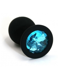 Чёрная силиконовая анальная пробка с голубым кристаллом - 7 см. - Kanikule - купить с доставкой в Тюмени