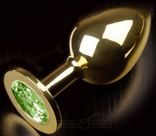 Золотистая анальная пробка с салатовым кристаллом - 9 см. - Пикантные штучки - купить с доставкой в Тюмени