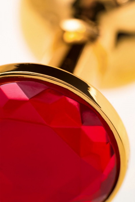 Малая золотистая анальная втулка с красным кристаллом - 6 см. - ToyFa - купить с доставкой в Тюмени
