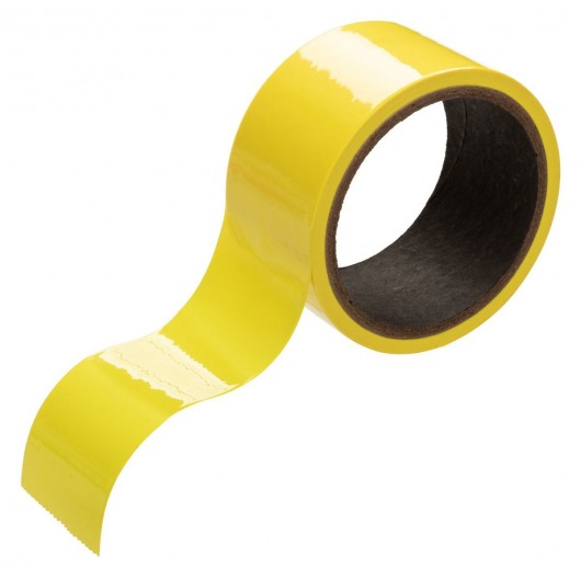 Желтый скотч для связывания Bondage Tape - 18 м. - California Exotic Novelties - купить с доставкой в Тюмени