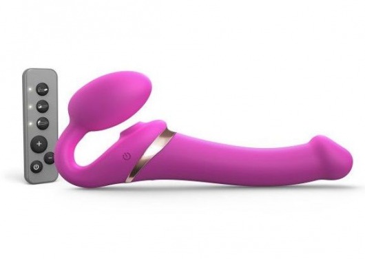 Ярко-розовый безремневой страпон Multi Orgasm Size M с клиторальной стимуляцией - Strap-on-me - купить с доставкой в Тюмени