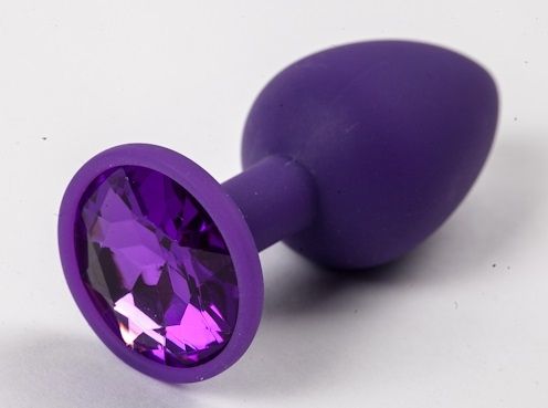 Фиолетовая силиконовая анальная пробка с фиолетовым стразом - 7,1 см. - 4sexdreaM - купить с доставкой в Тюмени
