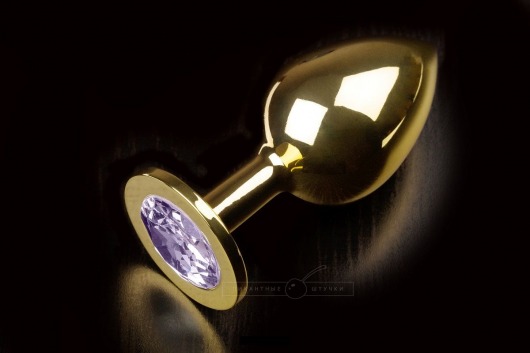 Большая золотая анальная пробка с закругленным кончиком и сиреневым кристаллом - 9 см. - Пикантные штучки - купить с доставкой в Тюмени