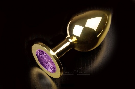 Большая золотая анальная пробка с закругленным кончиком и фиолетовым кристаллом - 9 см. - Пикантные штучки - купить с доставкой в Тюмени